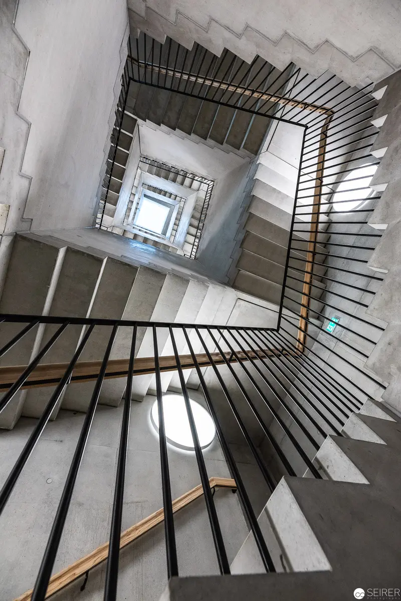 Architectural Stairwell Viewed from Above: Geometric Descent and Light