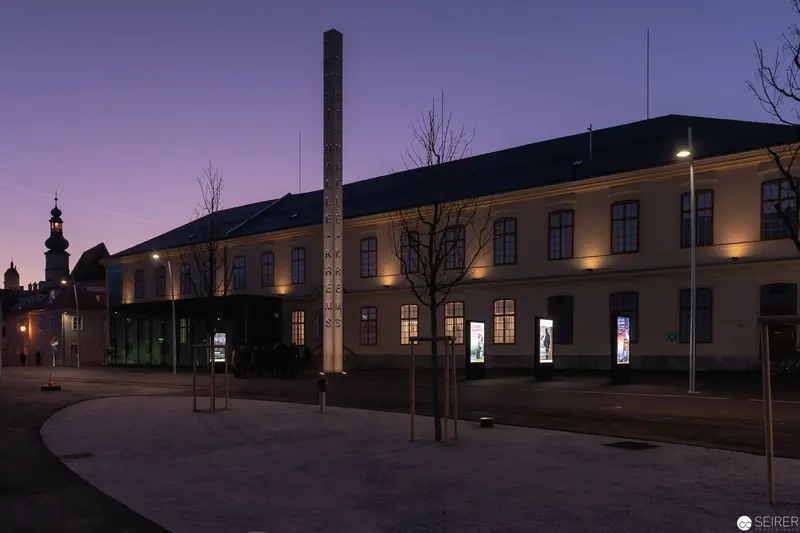 Twilight Illumination of Historic Municipal Building with Urban Streetscape