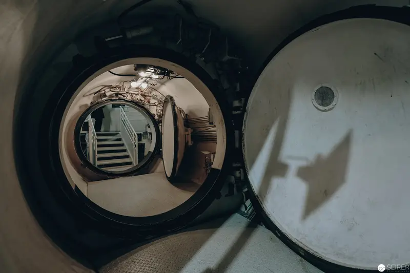 Architectural Photography of Decommissioned Nuclear Power Plant Interior through Porthole