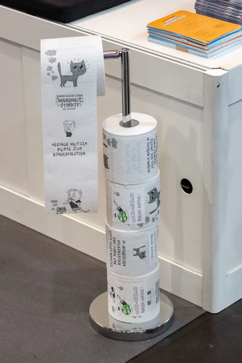 Illustrated Toilet Paper Roll on Minimalist Metal Stand in Domestic Setting