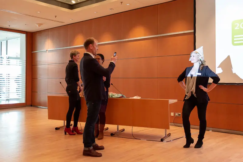 Corporate Interior: Professionals Gathered in Modern Minimalist Meeting Space
