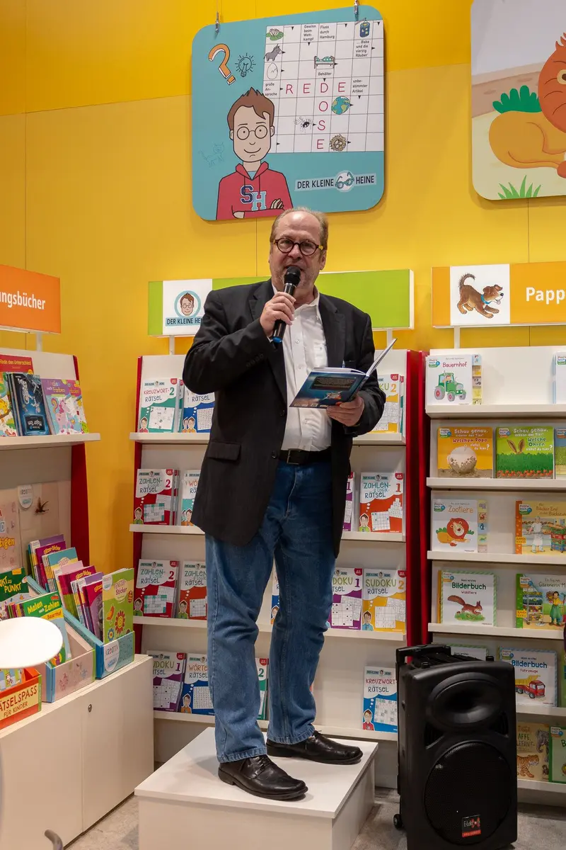 Author Presenting at Children's Bookstore During Literary Event