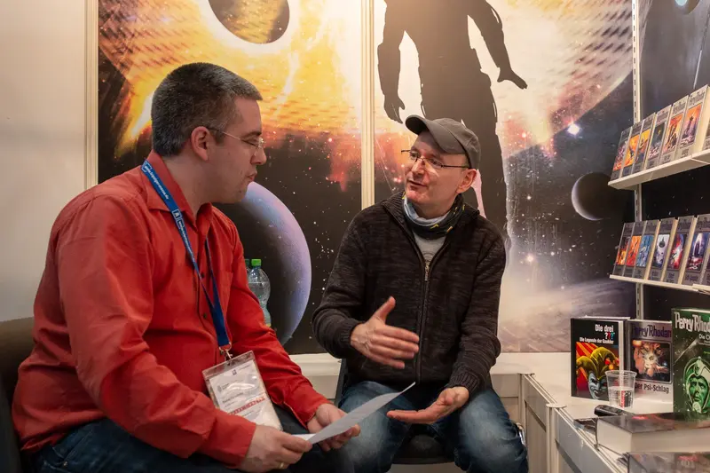 Conversation at Science Fiction Book Exhibition with Cosmic Background