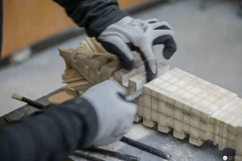 Stonemason Crafting Intricate Architectural Elements at St. Stephan Cathedral Workshop