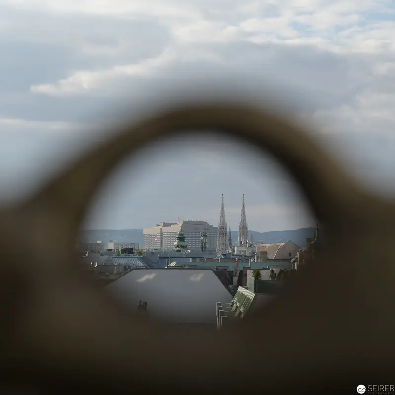 View of Vienna's Cityscape Through Circular Architectural Framing