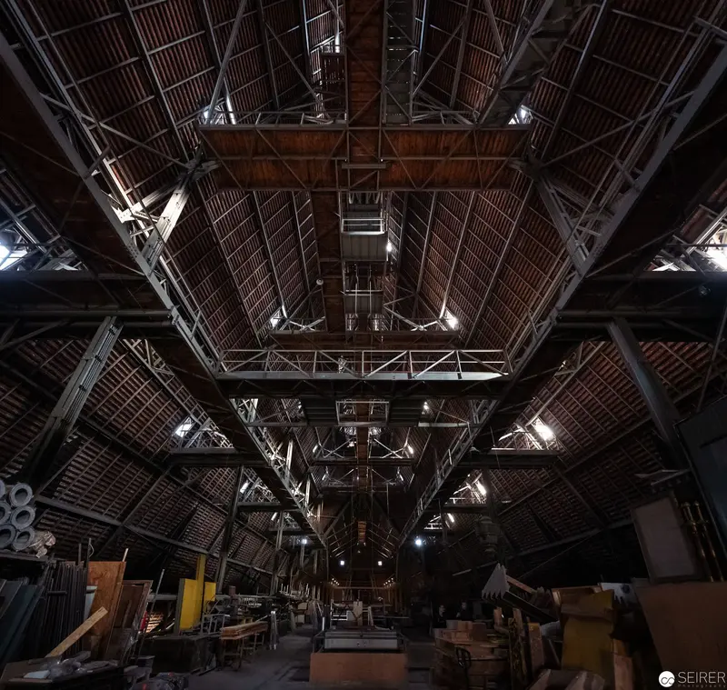 Industrial Attic Architecture: Complex Steel Truss and Wooden Roof Structure