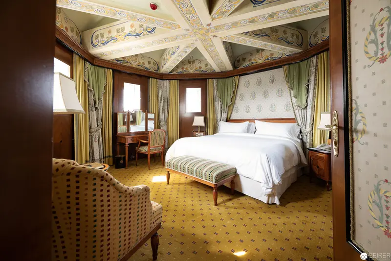 Luxurious Hotel Bristol Room with Ornate Ceiling and Elegant Period Decor