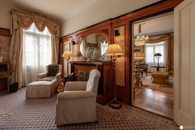 Interior View of Elegant Hotel Bristol Suite with Ornate Decor and Mirrored Reflections