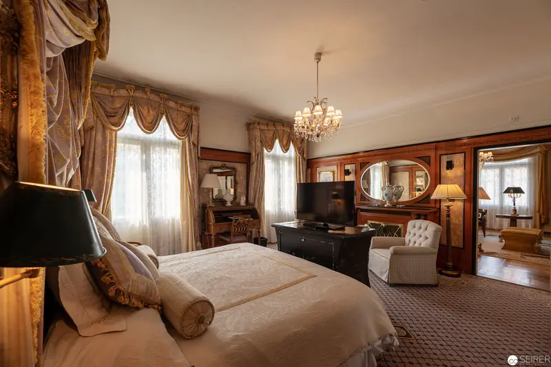 Luxurious Victorian-Era Hotel Bristol Vienna Bedroom Interior with Elegant Chandelier