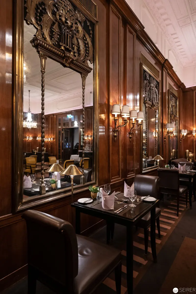 Elegant Wood-Paneled Dining Room at Hotel Bristol, Vienna Interior