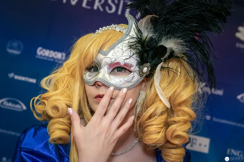 Masked Performance in Blonde Curls: Venetian Masquerade Costume Study