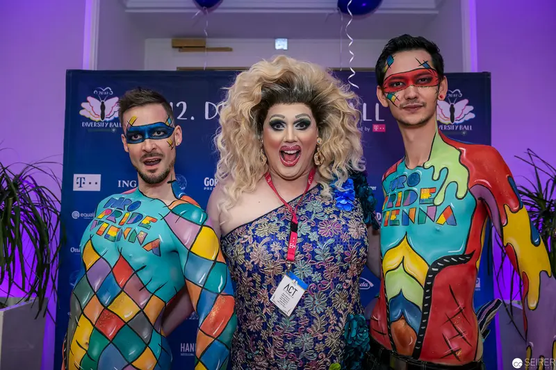 Pride Event Body Art Performance with Drag Queen and Colorful Costumed Performers
