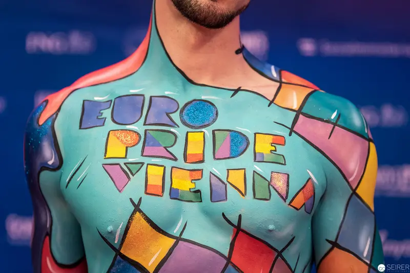 Body Painted with Colorful "Euro Pride Vienna" Typography and Geometric Design