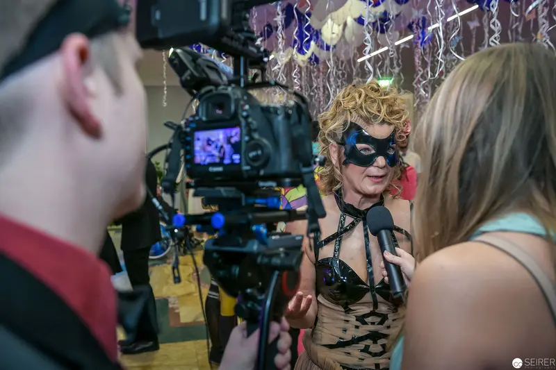 Behind-the-Scenes Documentary Filming of Performer in Masked Costume