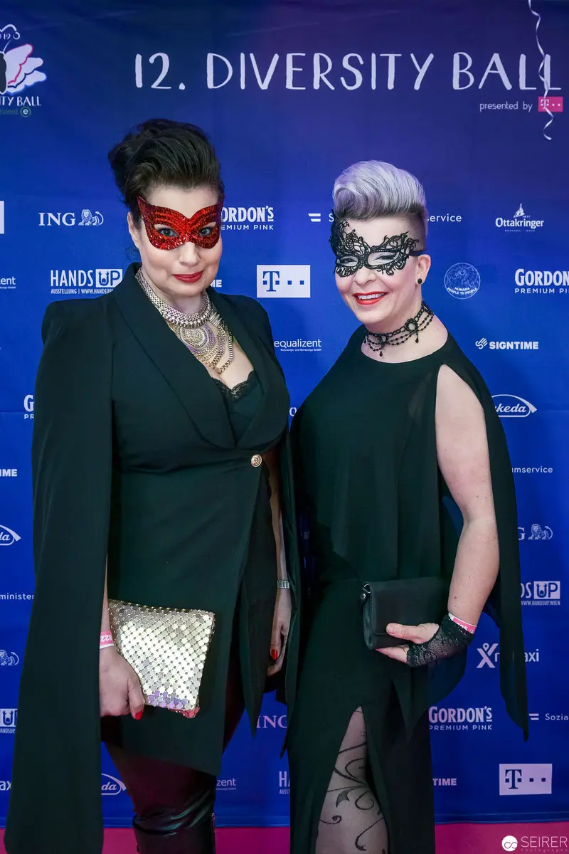 Two Figures in Masquerade at 12th Diversity Ball Gala Event