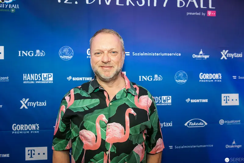 Flamingo-Patterned Shirt at 12. Diversity Ball Event Backdrop