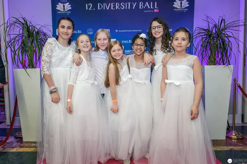 Six Young Girls in White Dresses at 12th Diversity Ball Photoshoot