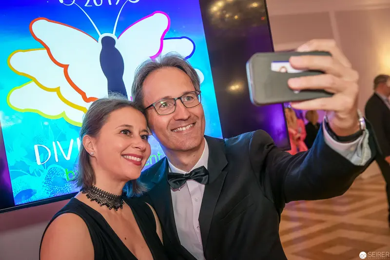 Formal Event Selfie with Butterfly Logo Backdrop, 2017