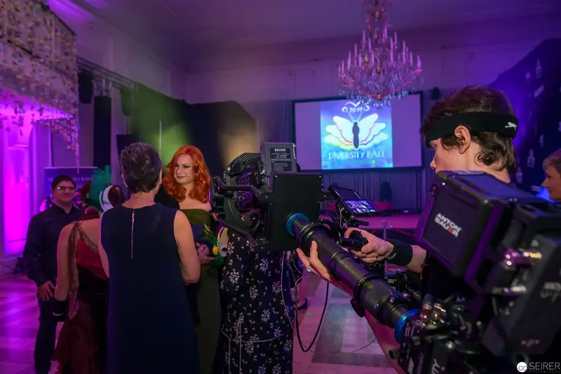 Production Crew at Media Event with Professional Video Camera Operators