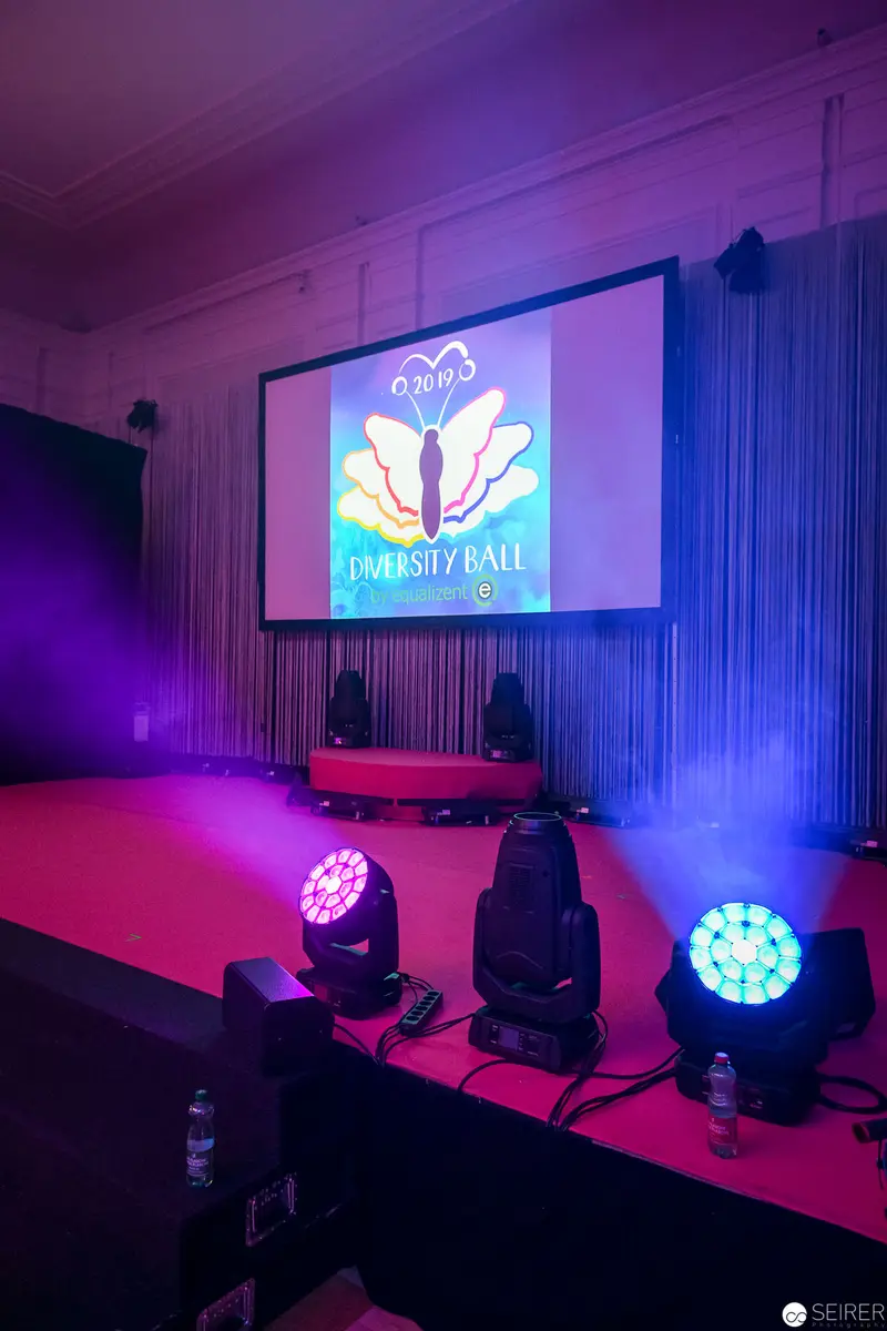 University Ball Lighting Setup with Projection Screen and Stage Illumination