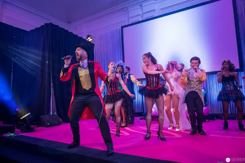 Performance Ensemble in Red and Black at Dynamic Stage Production