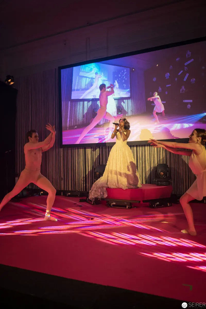 Performance Tableau with Dancers and Video Projection on Dynamic Illuminated Stage
