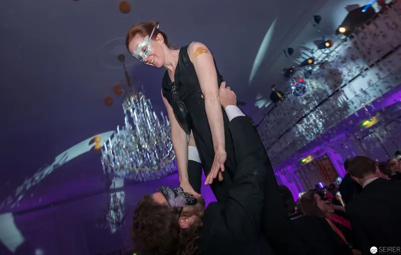 Performance Art Dance: Dramatic Lift and Balance at Stylized Evening Event