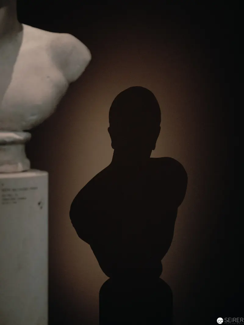 Shadowy Silhouette Against Warm Background in Film Location Reportage