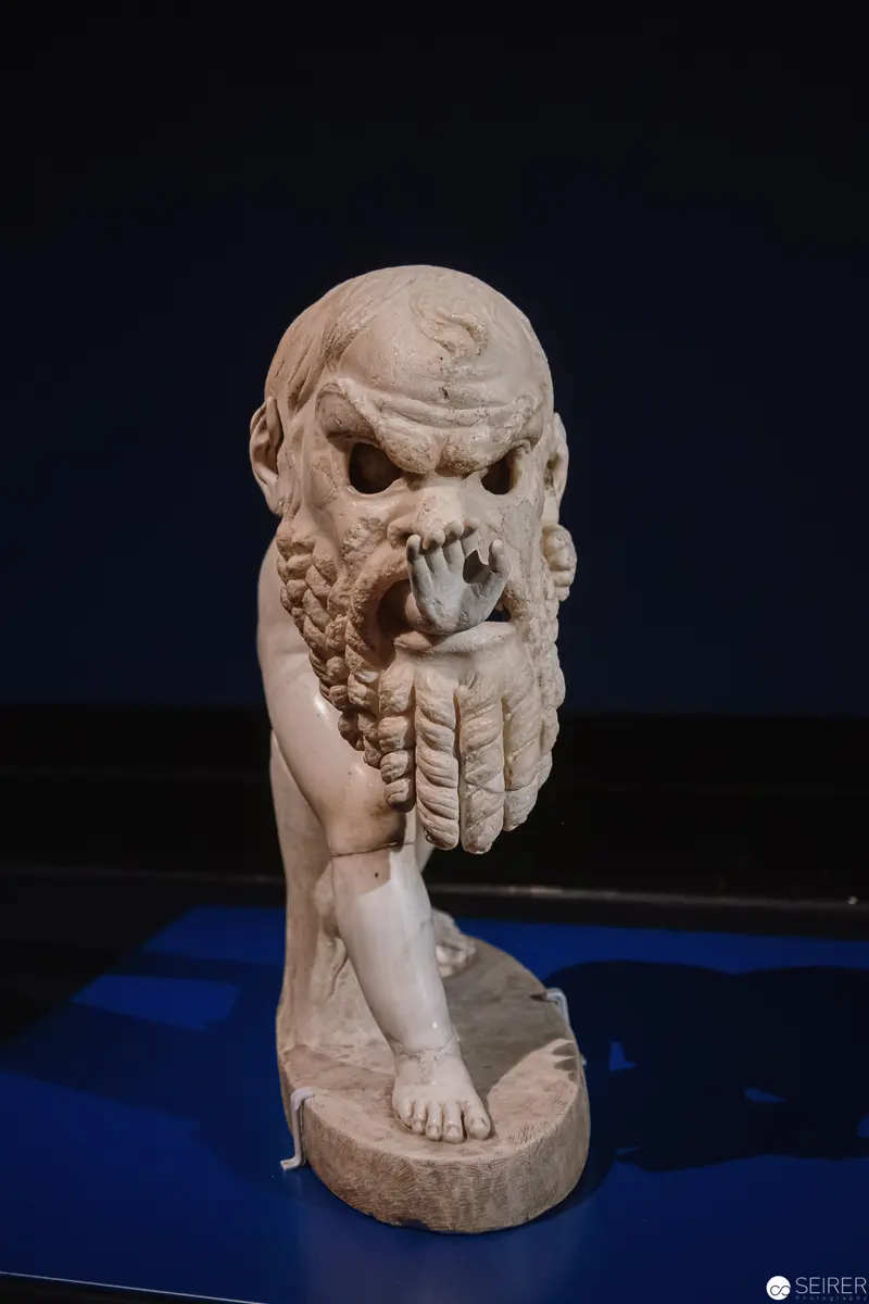 Marble Sculpture of Pensive Figure with Distorted Emotional Expression