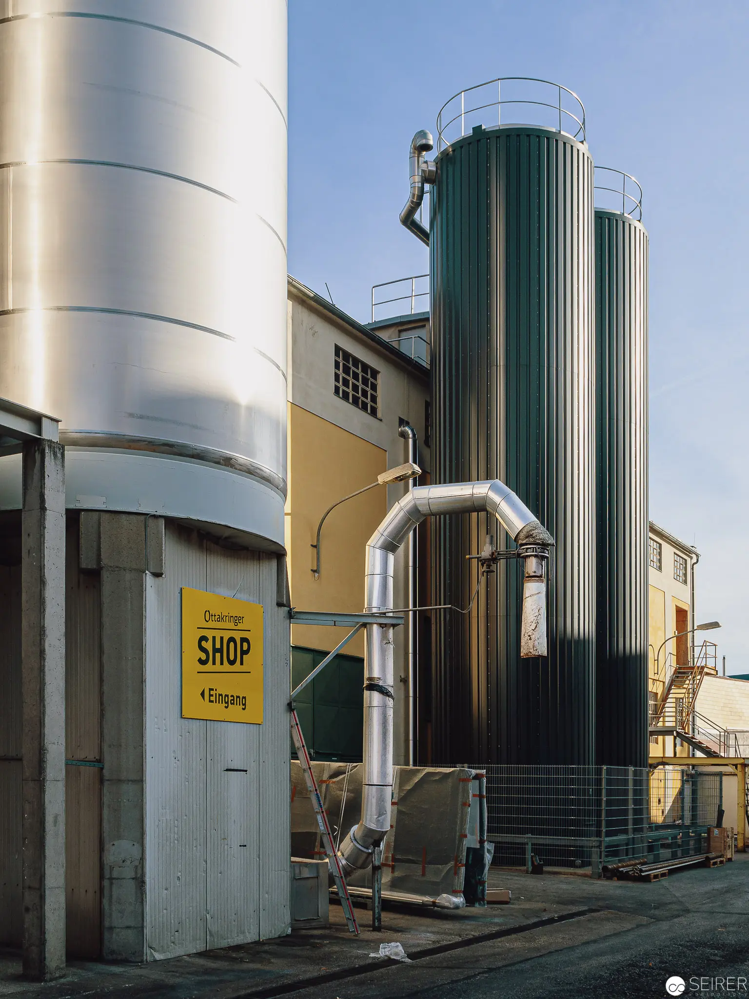 Industrial Facility with Cylindrical Storage Tanks and Metallic Infrastructure