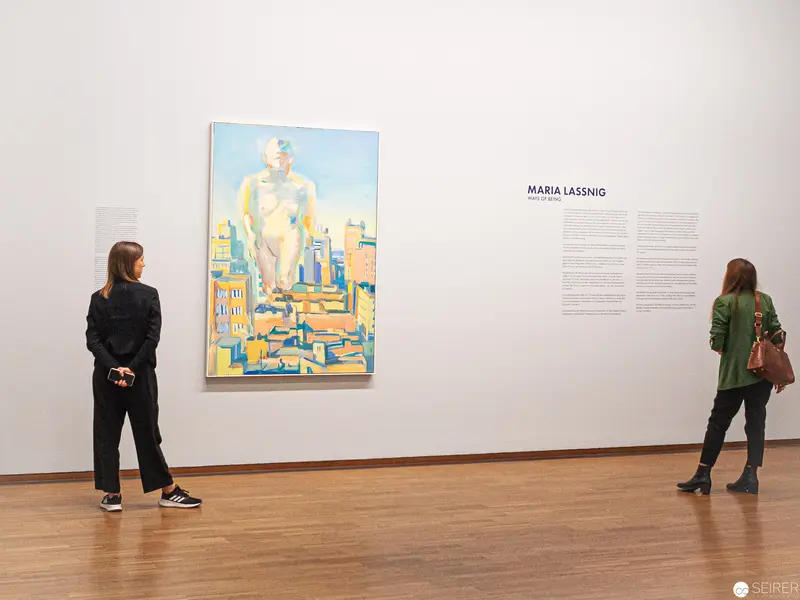 Maria Lassnig Exhibition at Albertina: Viewers Contemplating Abstract Urban Figurative Painting