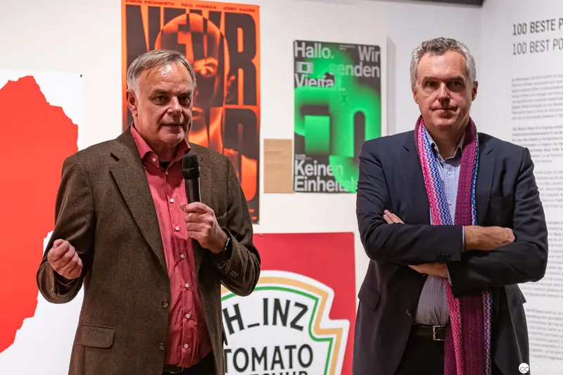 MAK Exhibition Speakers with Heinz Tomato Poster and Graphic Design Backdrop