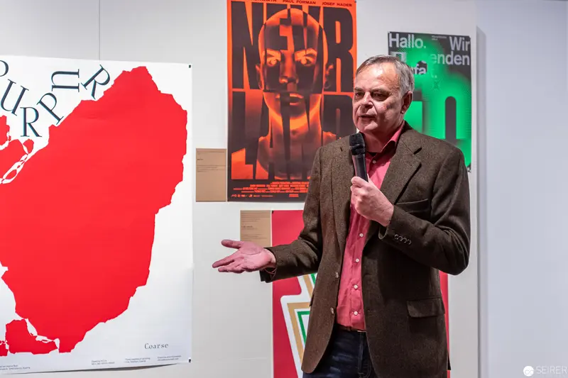 MAK Lecture: Graphic Design Presentation with Vibrant Poster Background