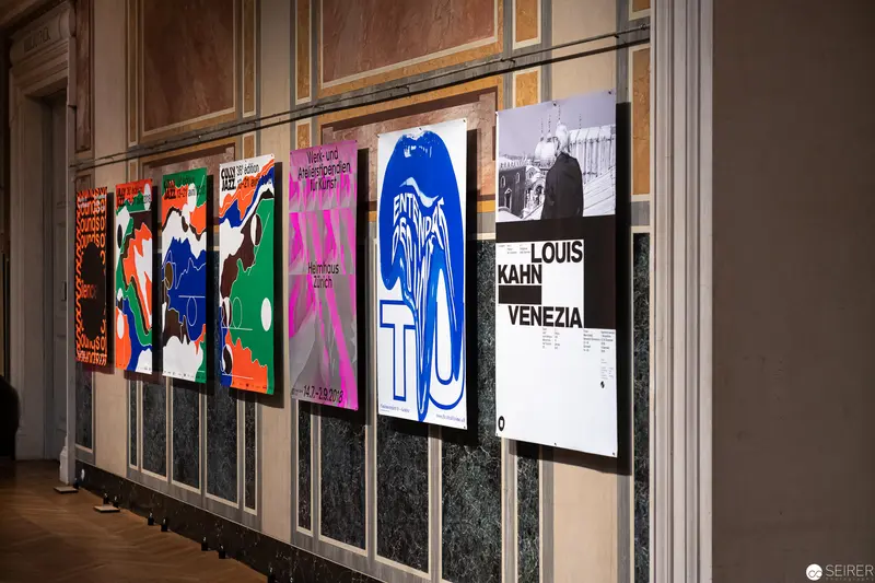 MAK Exhibition: Graphic Design Posters Displayed on Textured Museum Walls