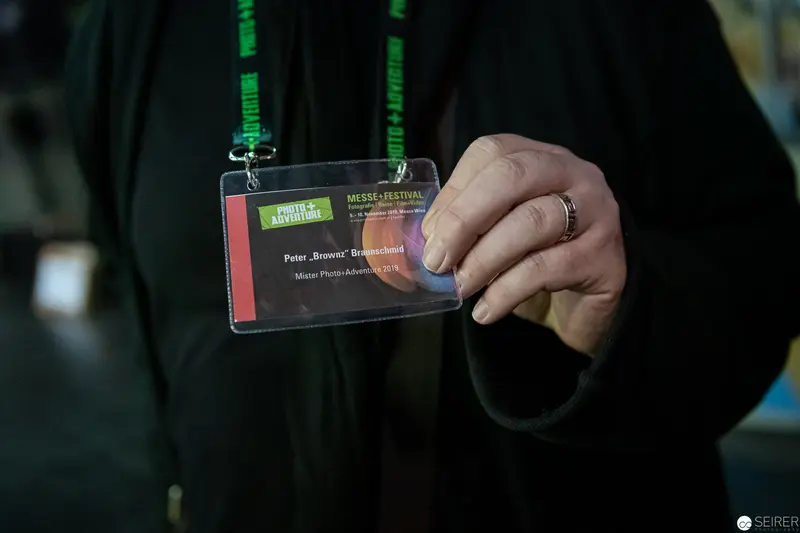 Conference Badge Displayed at Media Festival Event During Registration