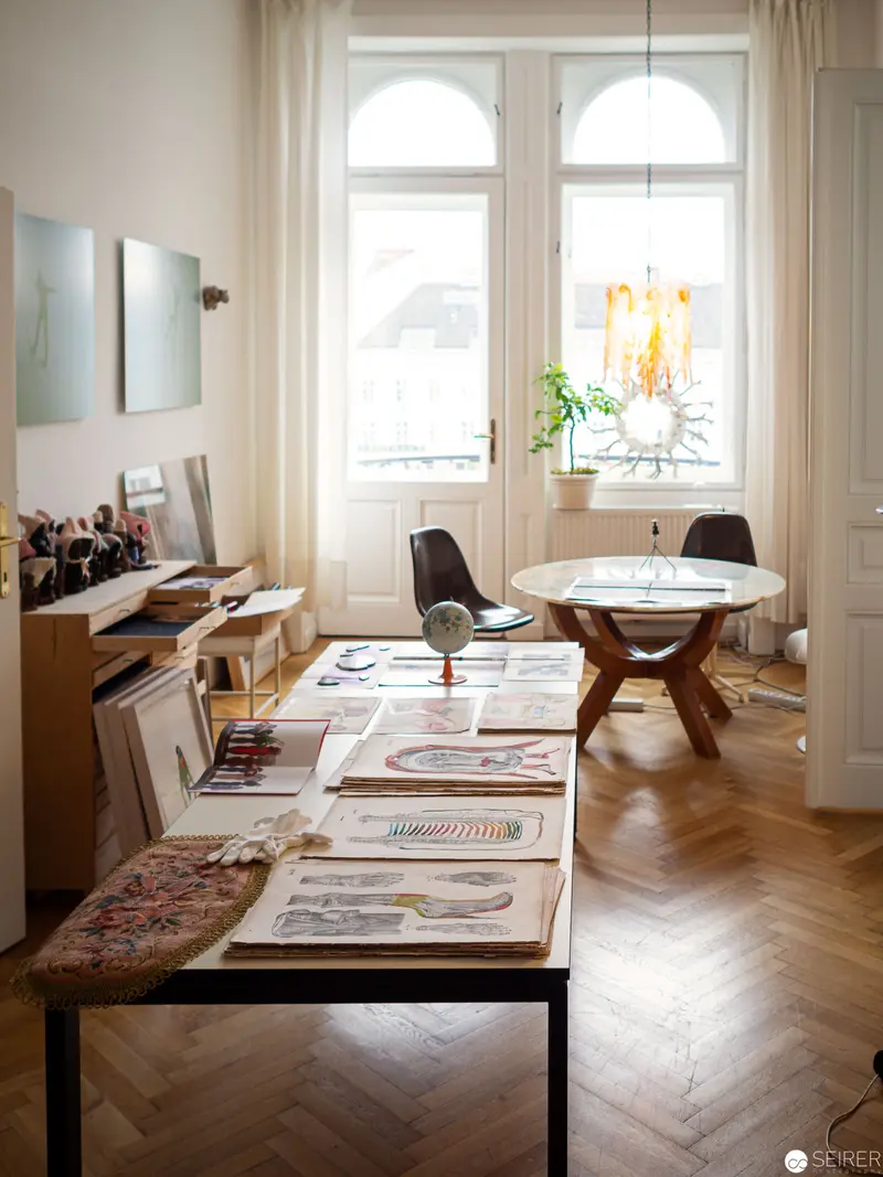 Interior Study of Design Workspace with Herringbone Floors and Arched Windows