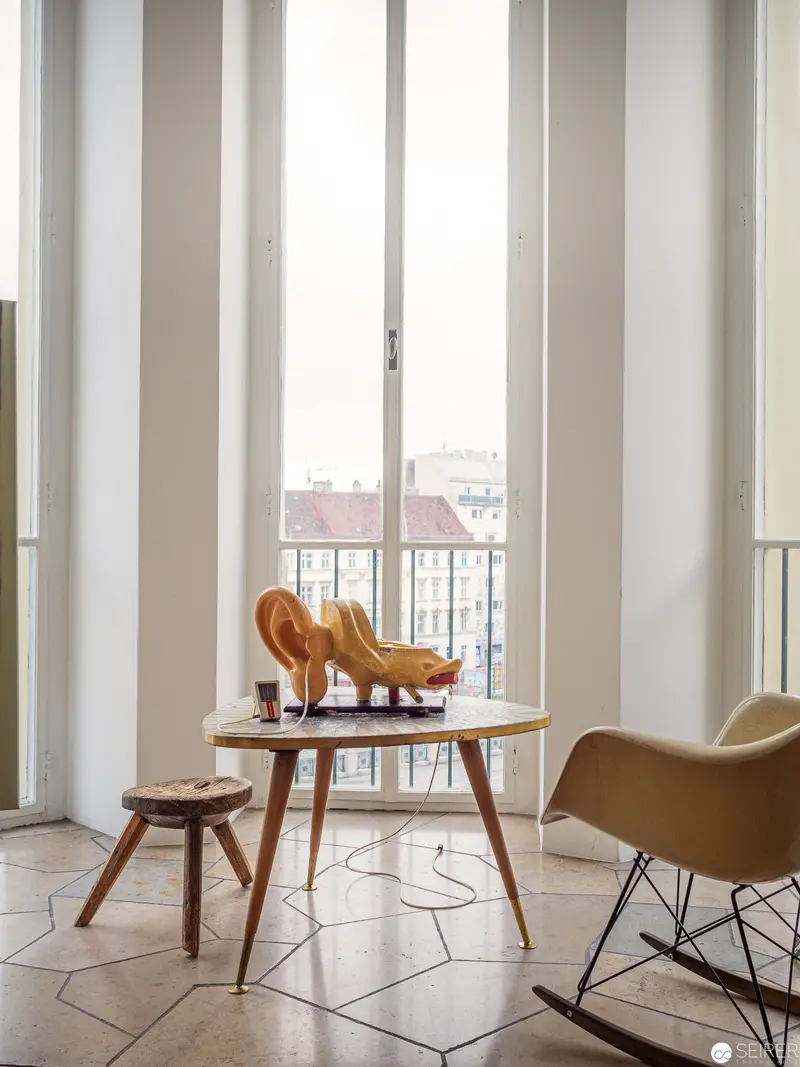 Mid-Century Modern Interior with Rocking Chair and Sculptural Object