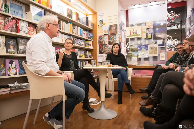 Book Store Panel Discussion with Multiple Speakers and Audience Members