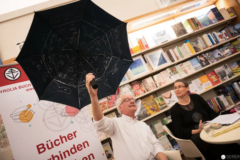Book Fair Presentation with Constellation Umbrella in Library Setting