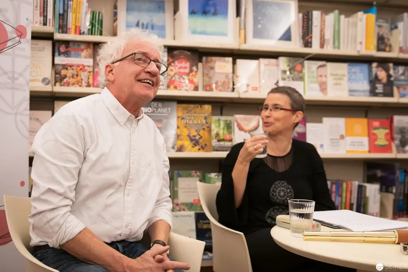 Public Discussion at Bookstore Event with Two Speakers