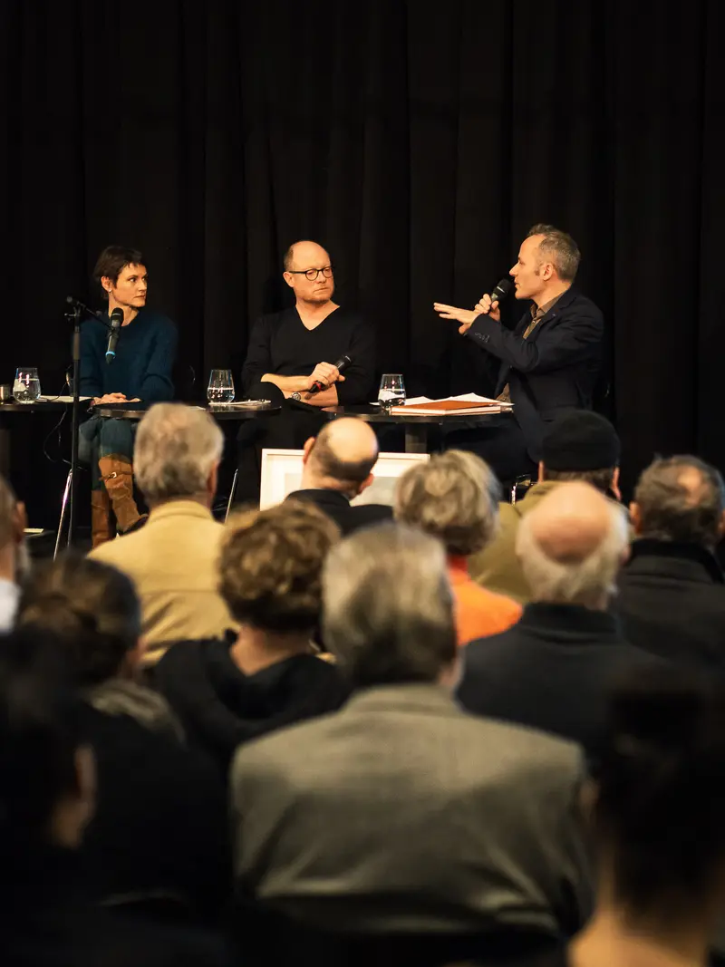 Panel Discussion with Three Speakers at Academic or Cultural Event