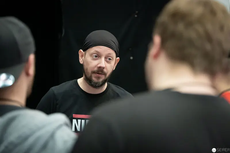 Bearded Man in Black Durag Engaging in Conversation at Vienna ComicCon 2019