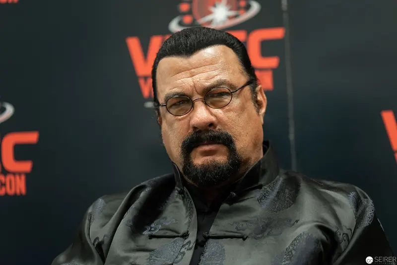 Steven Seagal at Vienna ComicCon 2019, Intense Portrait in Dark Attire