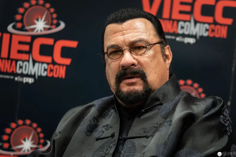 Steven Seagal at Vienna Comic Con 2019 in Ornate Black Embroidered Jacket