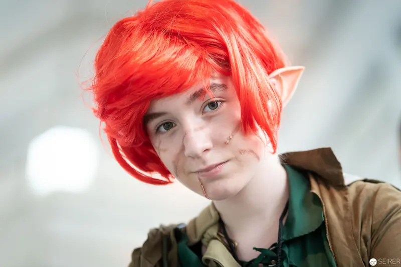 Cosplayer with Bright Red Wig at Vienna ComicCon 2019