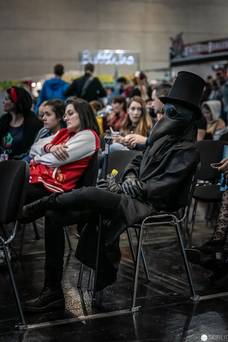 Costumed Attendee in Black Suit and Top Hat at Vienna ComicCon 2019