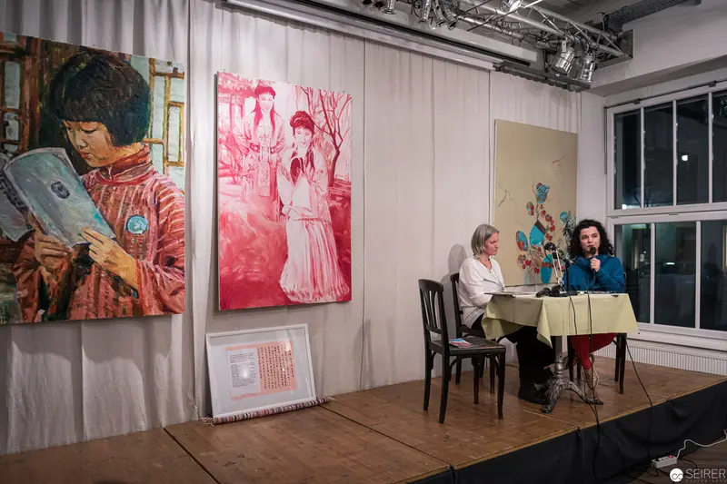 Art Gallery Exhibition with Painted Portraits and Live Discussion Panel