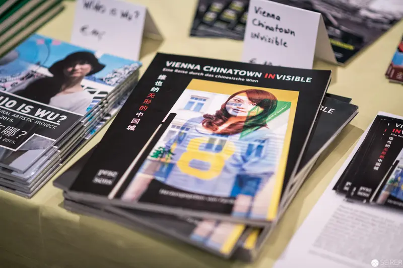 Vienna Chinatown Invisible Publication Display with Multilingual Magazine Covers