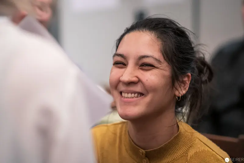 Candid Portrait of Smiling Woman in Mustard Yellow Sweater