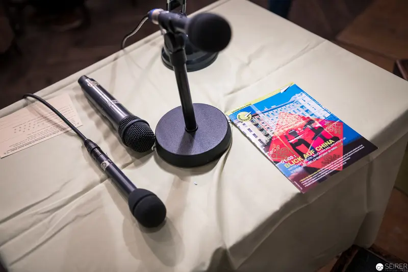 Radio Station Studio Setup with Microphones and Magazine